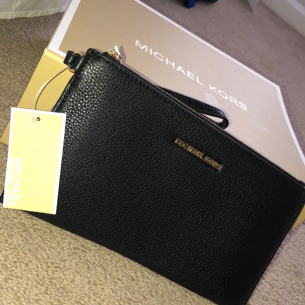 Brand new MK black leather wristlet
